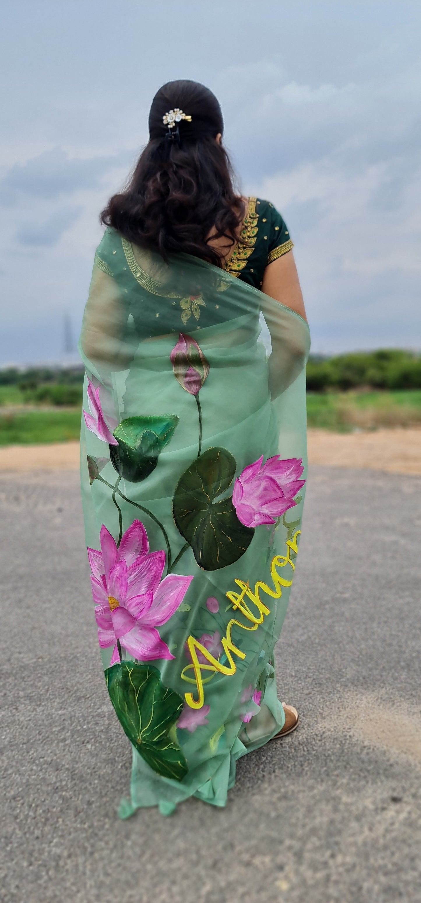 Pastel green,Lotus handpainted organza saree