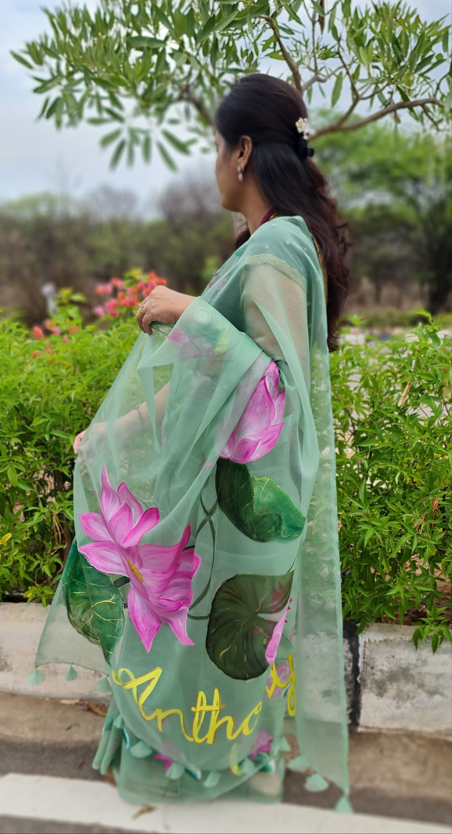 Pastel green,Lotus handpainted organza saree