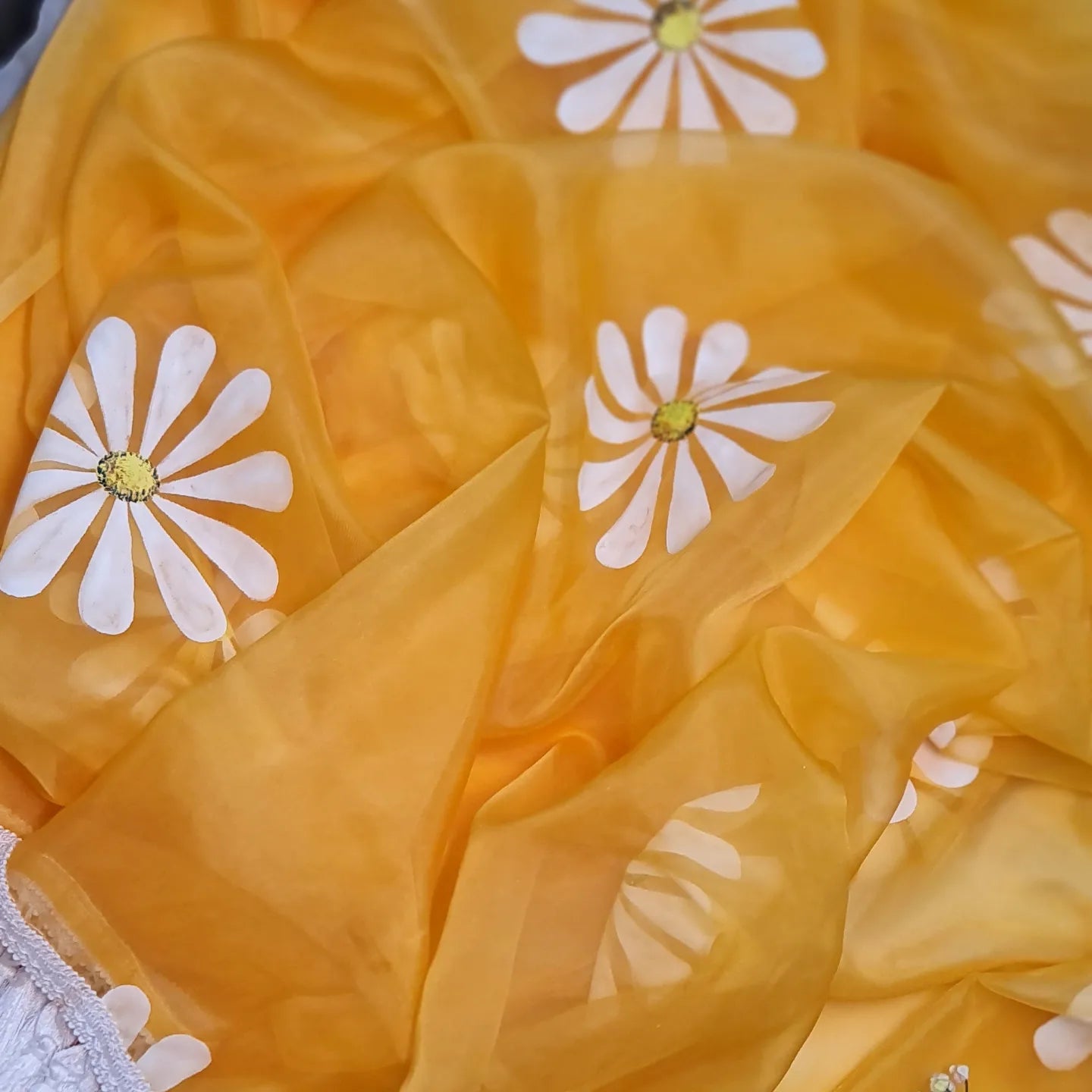 Yellow organza saree,with handpainted white Daisies