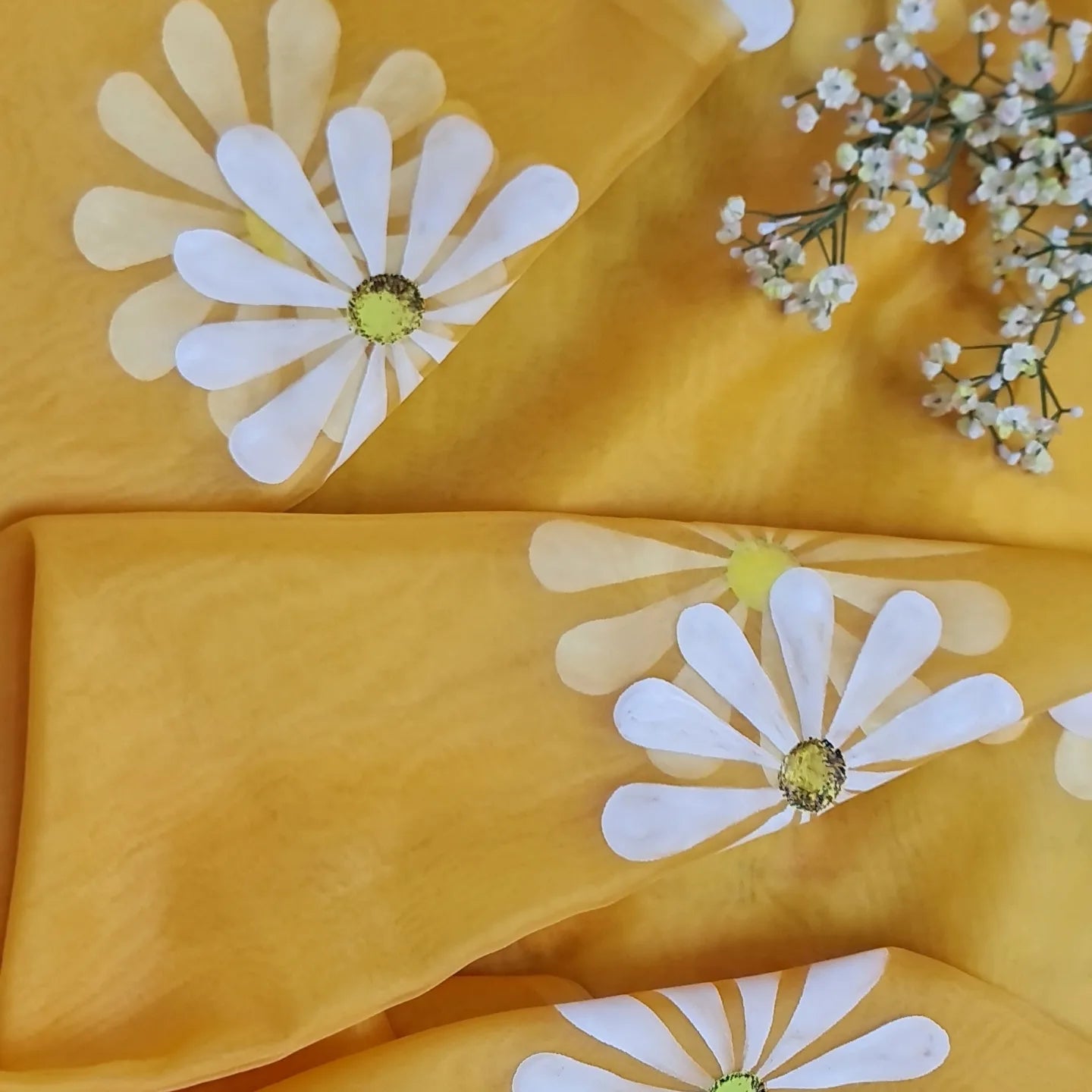 Yellow organza saree,with handpainted white Daisies