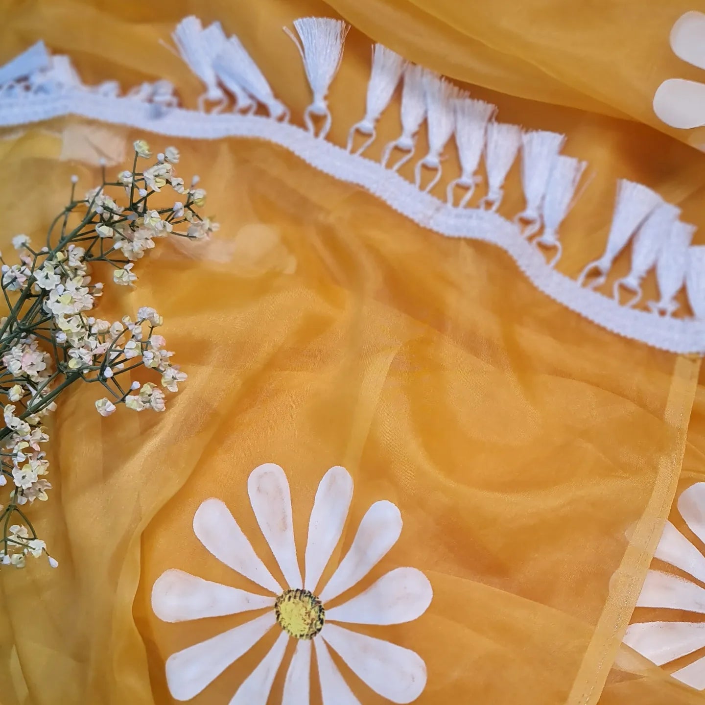 Yellow organza saree,with handpainted white Daisies