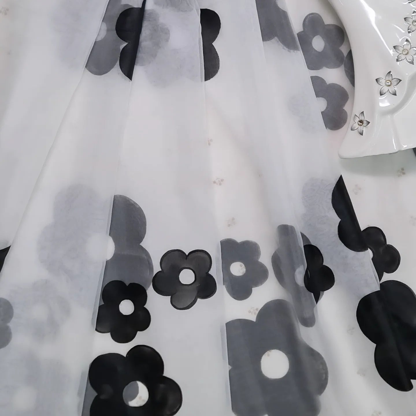 White organza saree with handpainted black daisies